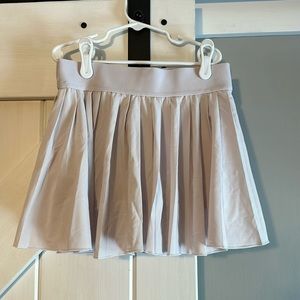 purple TNA tennis skirt